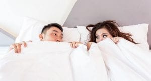 couple trying to sleep