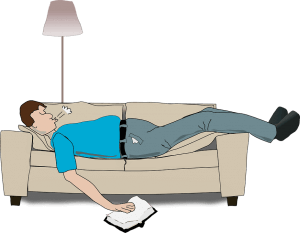 man sleeping on couch